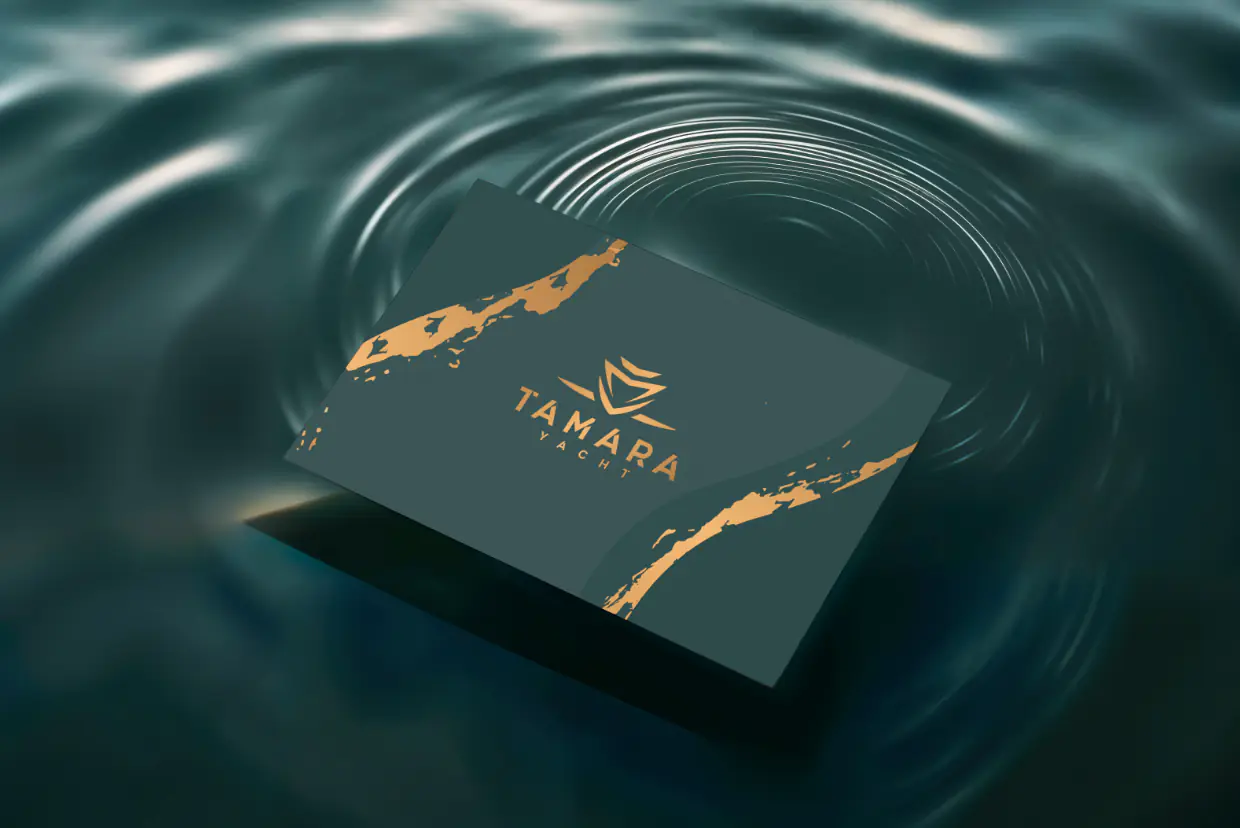 Tamara Yacht business card on the water